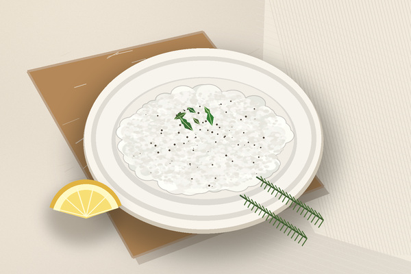 Fromage frais maison aux herbes dans une assiette avec un citron